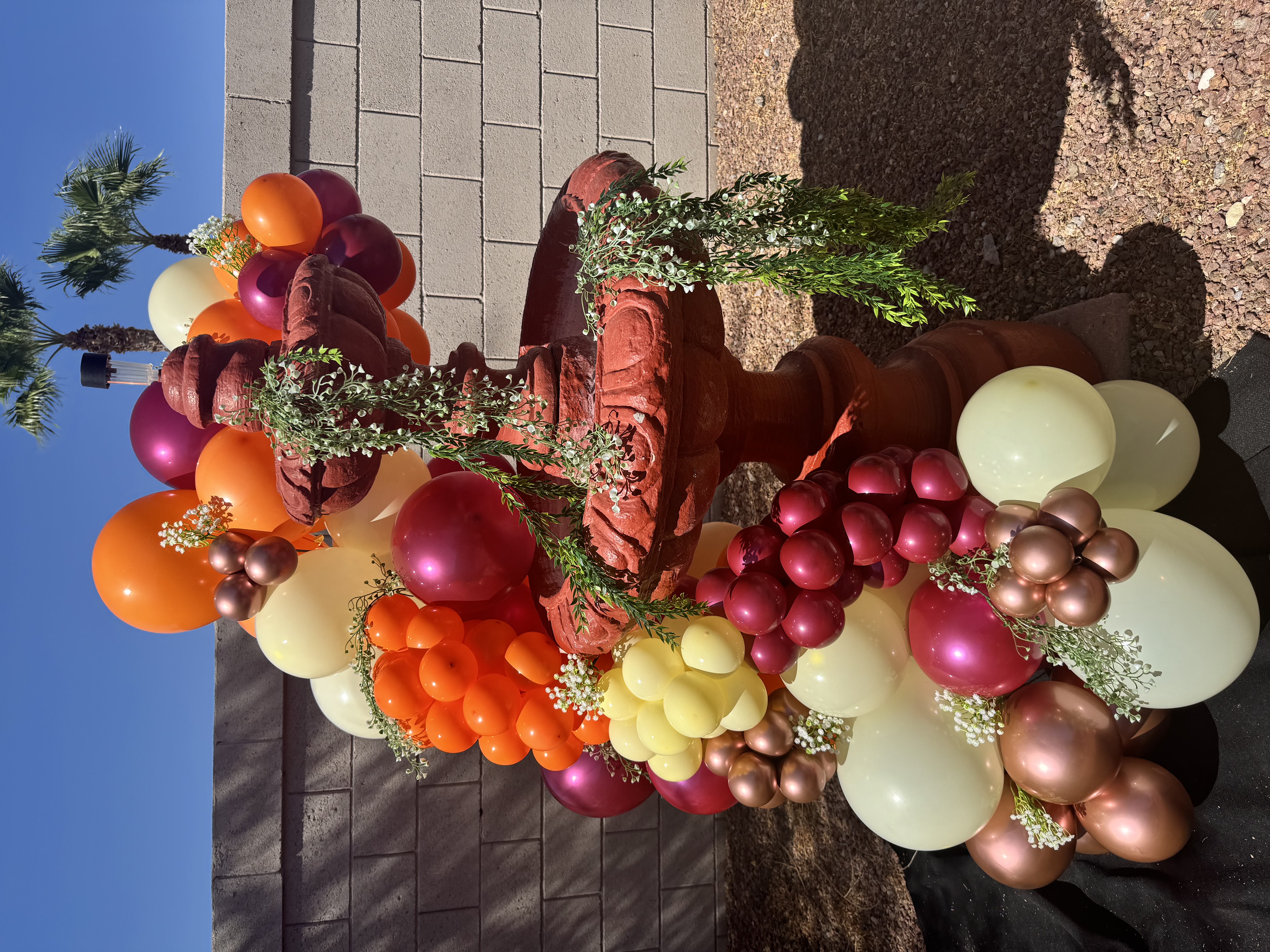 Terracotta fountain balloon arrangement